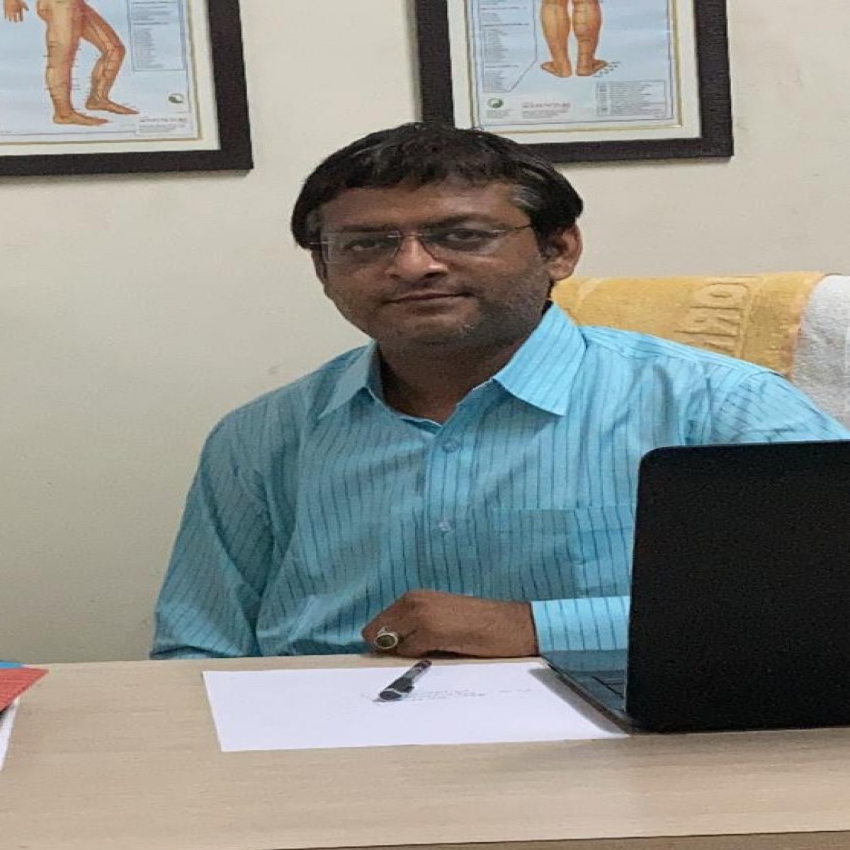 DR. RAJ TASKAR